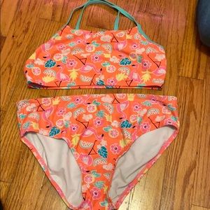 A very cute tropical bikini w cross back top